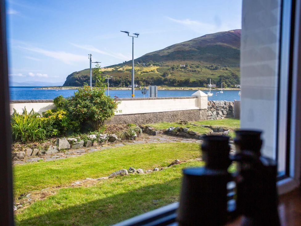 A view of water and mountains with binoculars at Fereneze, Lochranza, Isle Of Arran