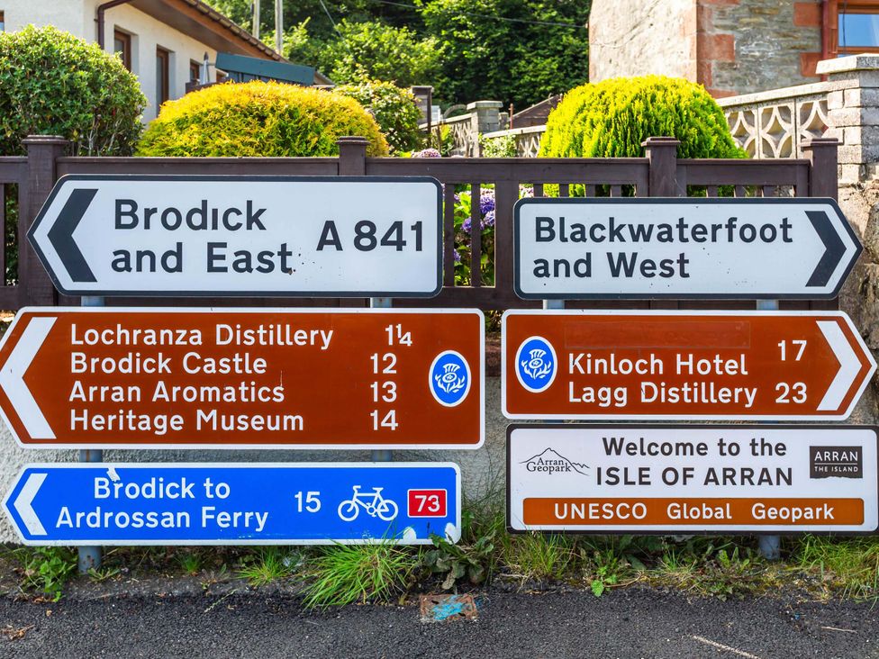 Road signs indicating directions to various locations on the Isle of Arran