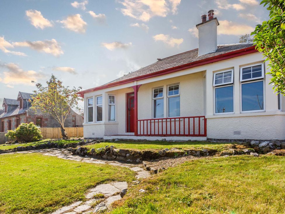 A house with a garden and pathway at Fereneze, Lochranza, Isle Of Arran