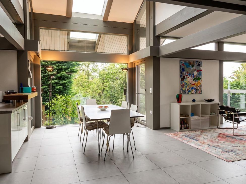 A dining room with a table and chairs at Two Hoots Littleworth
