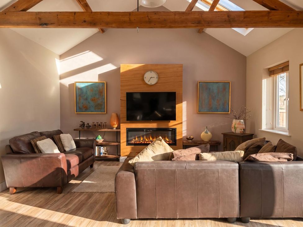 A living room with a television and fireplace at 
