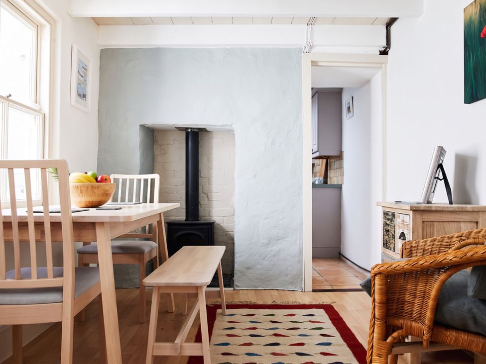 A dining room with a table and chairs at The Old Barn in Manchester