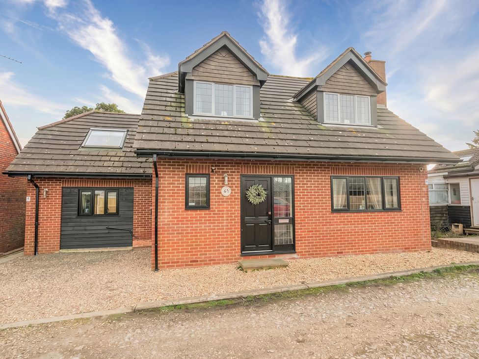 A house with a front door and windows at property in UK