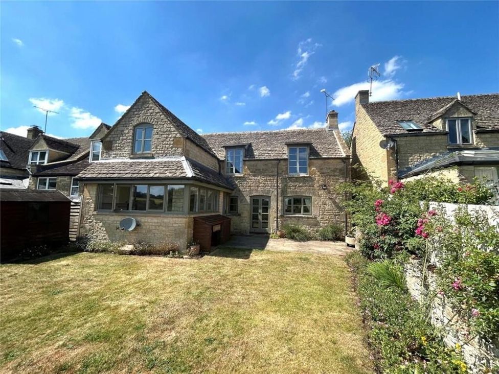 A house with a garden and windows at 