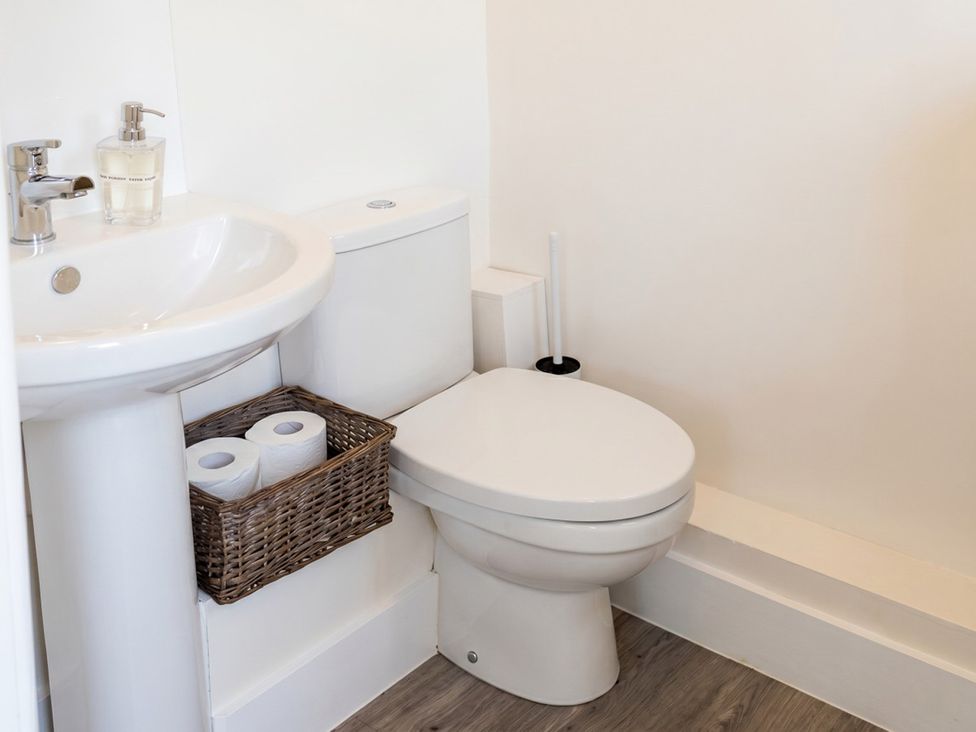A sink and toilet in a bathroom at 
