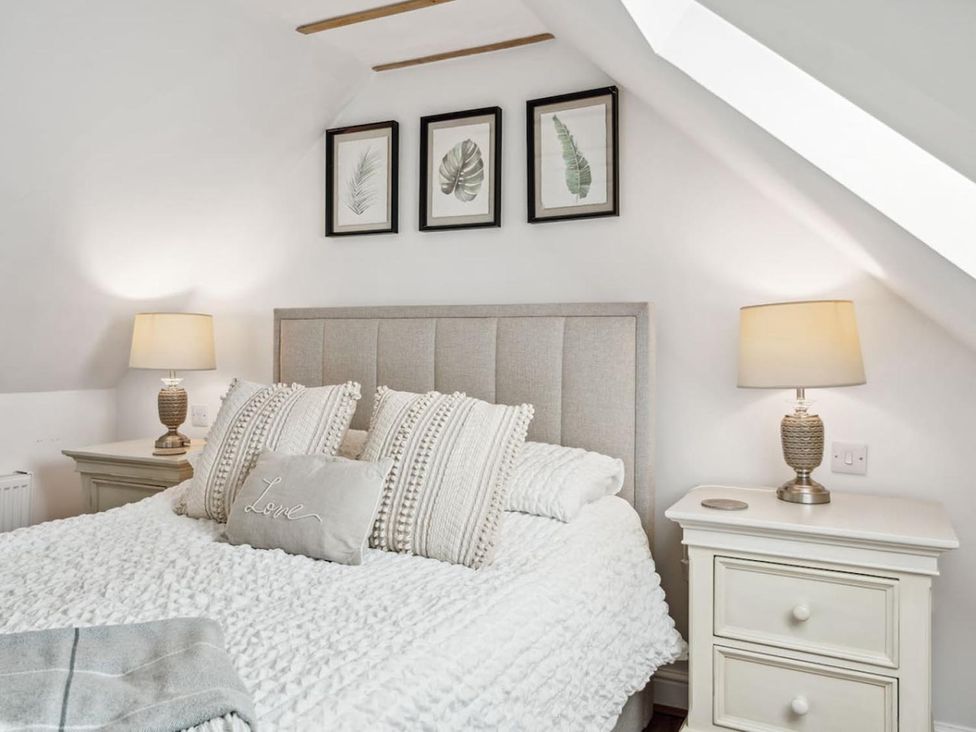 A bedroom with a bed and bedside table at The property in The location