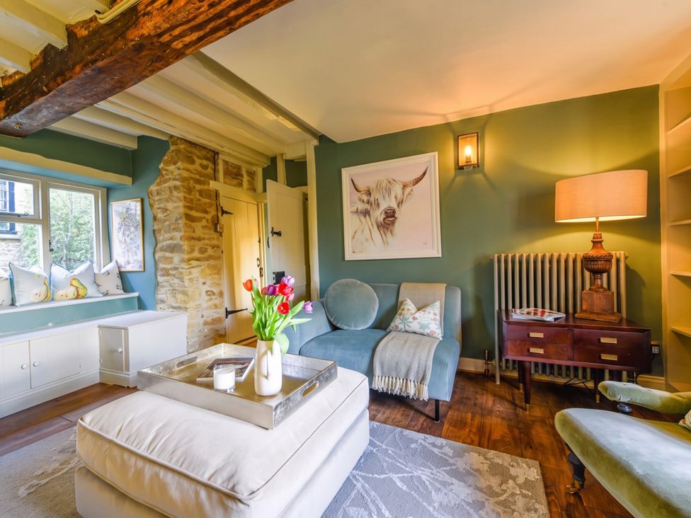 A living room with a sofa and coffee table at the property in the location