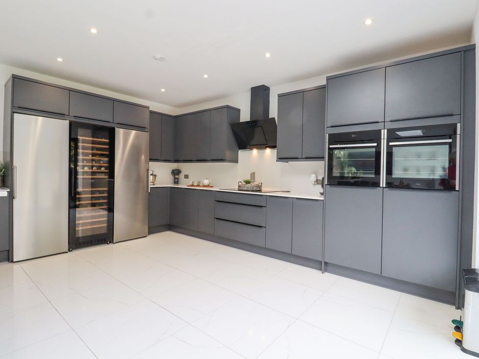 A kitchen with modern appliances at Berisal in Ashford