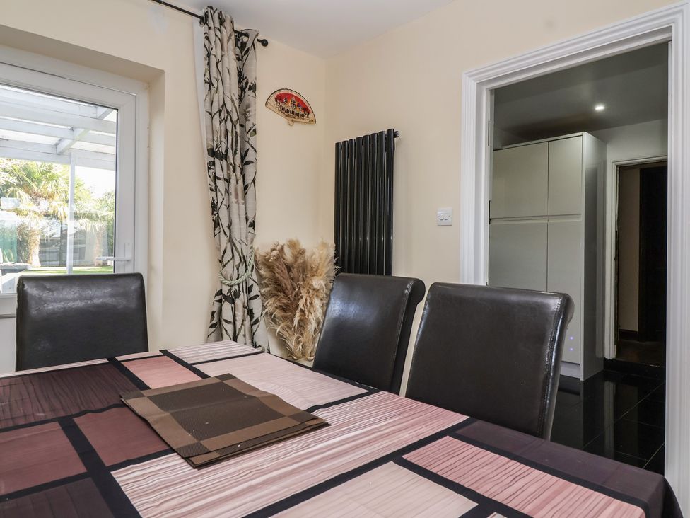 A dining room featuring a table and chairs at 19 Hailey Road