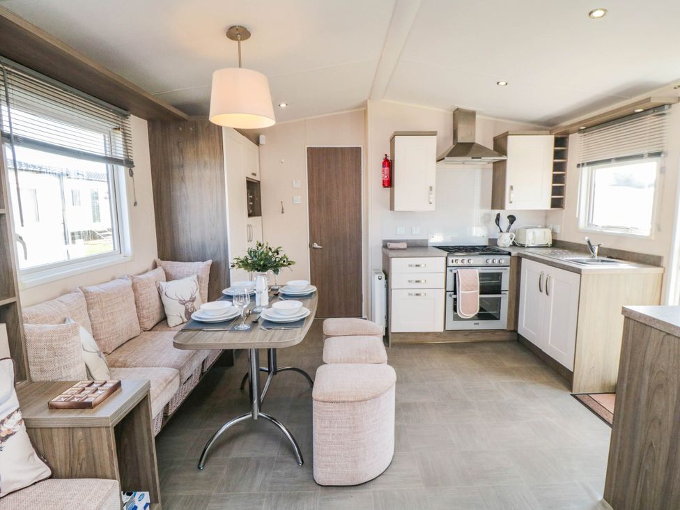 A kitchen with seating area and appliances at Gosling 14 in Scarborough