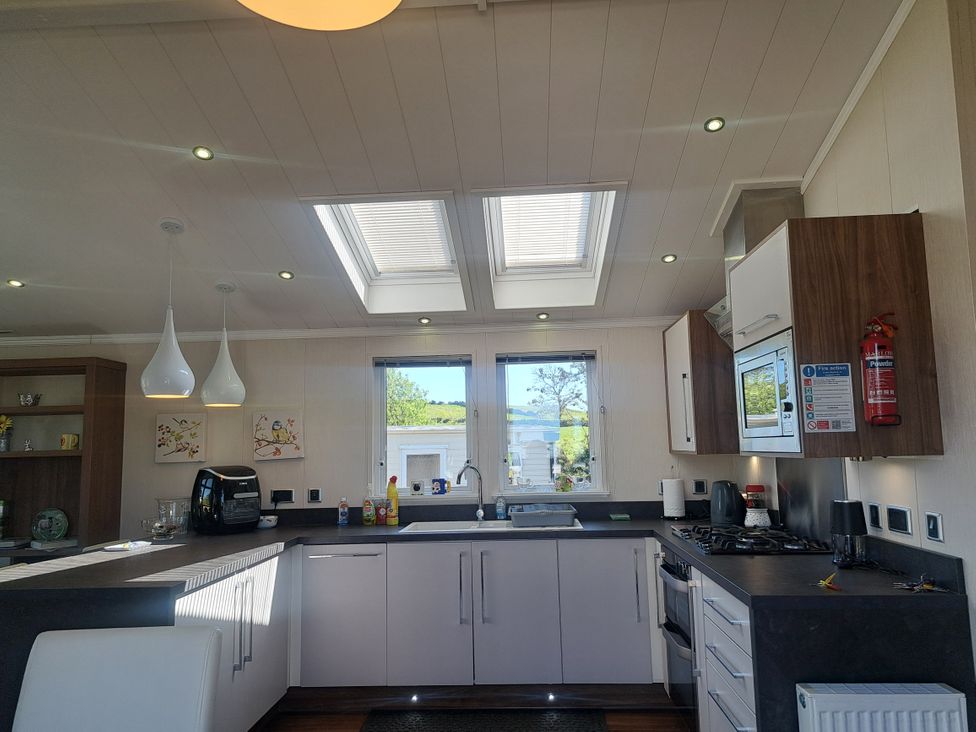 A kitchen with skylights and appliances at Chapel Farm Static Caravan Holiday Park Lucky Lodge 7 Appleby-in-Westmorland