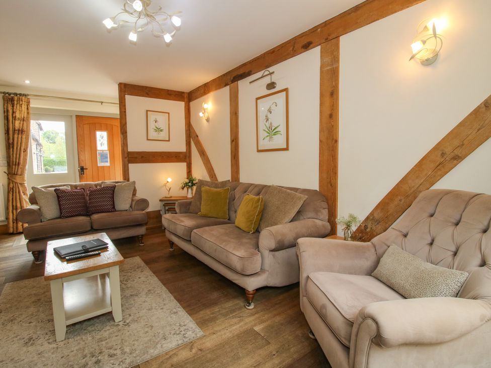 A living room with two sofas and a coffee table at The Turnip House in Westhope
