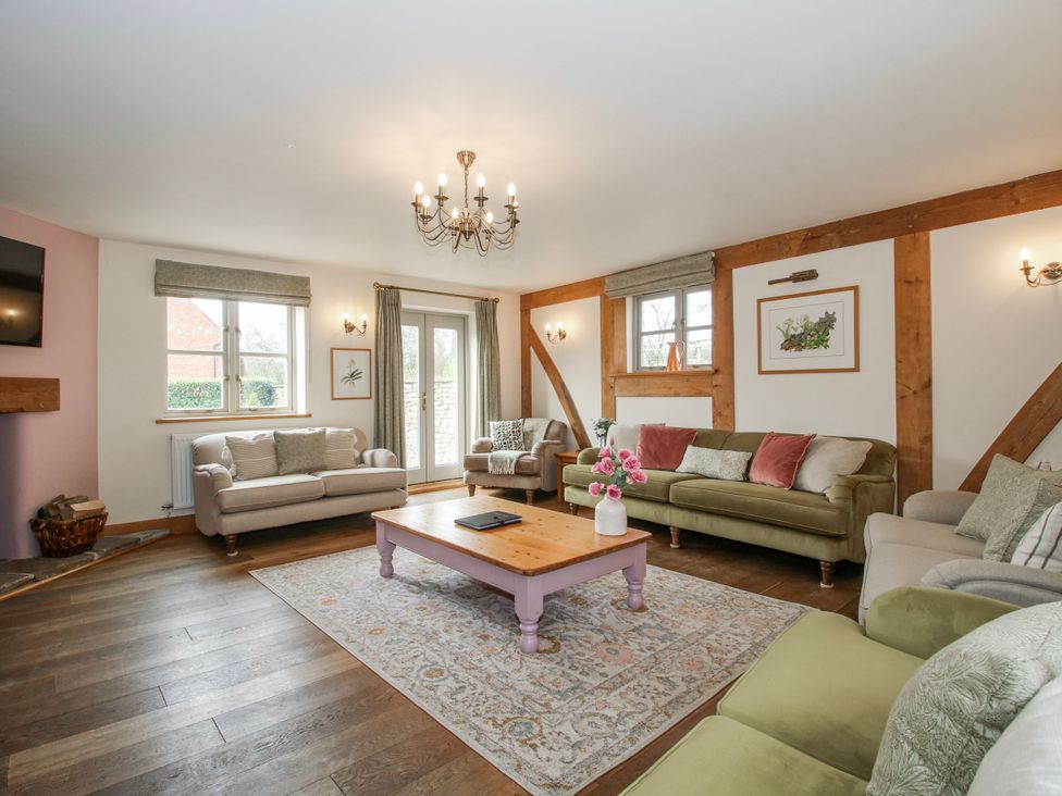 A living room with sofas and a coffee table at The Milking Parlour in Westhope