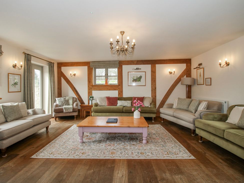 A living room with sofas and a coffee table at The Milking Parlour in Westhope