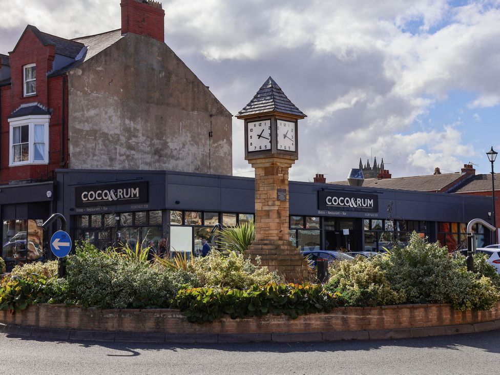 A clock and restaurant on a roundabout at Primrose Lodge in Saltburn-by-the-Sea