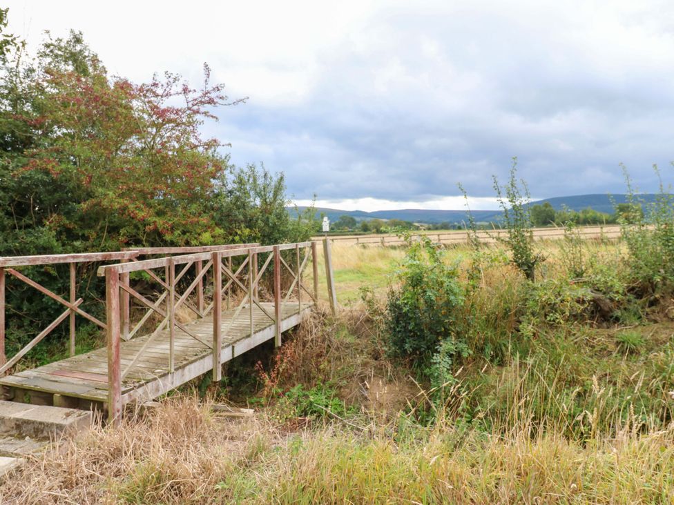 A bridge over grassland at Pottowe Cottage in Potto near Stokesley