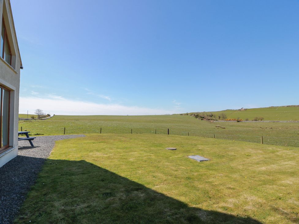 An outdoor view of fields from the property at South Milton Cottage, Stairhaven near Glenluce