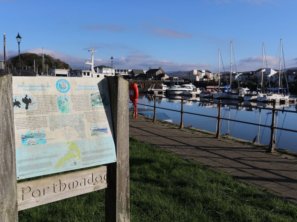 An information board near the marina with boats at Maritime Mews, 6 The Oakleys in Porthmadog