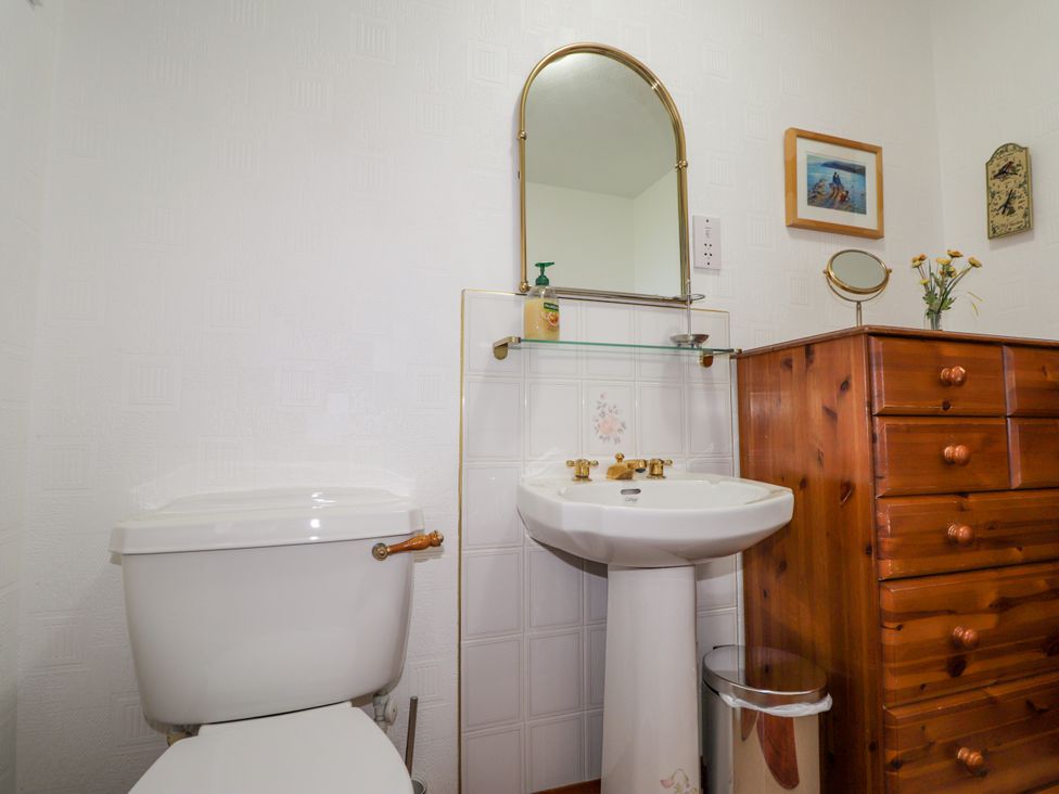 A bathroom with a sink and toilet at Braehead Croft Portessie near Buckie