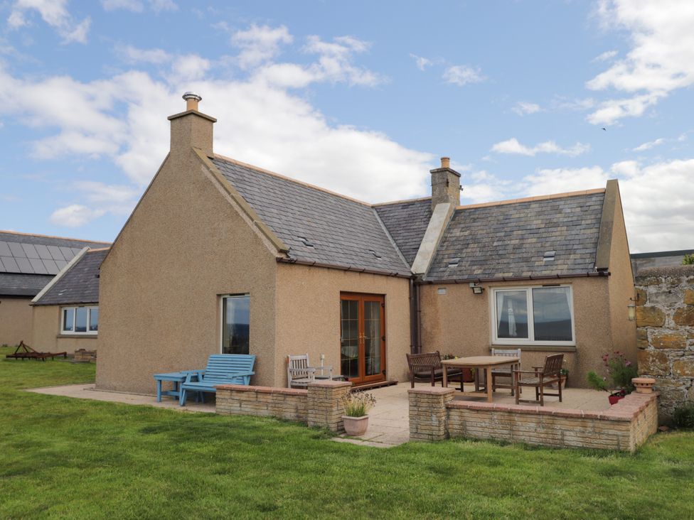 A house with patio furniture at Braehead Croft, Portessie near Buckie