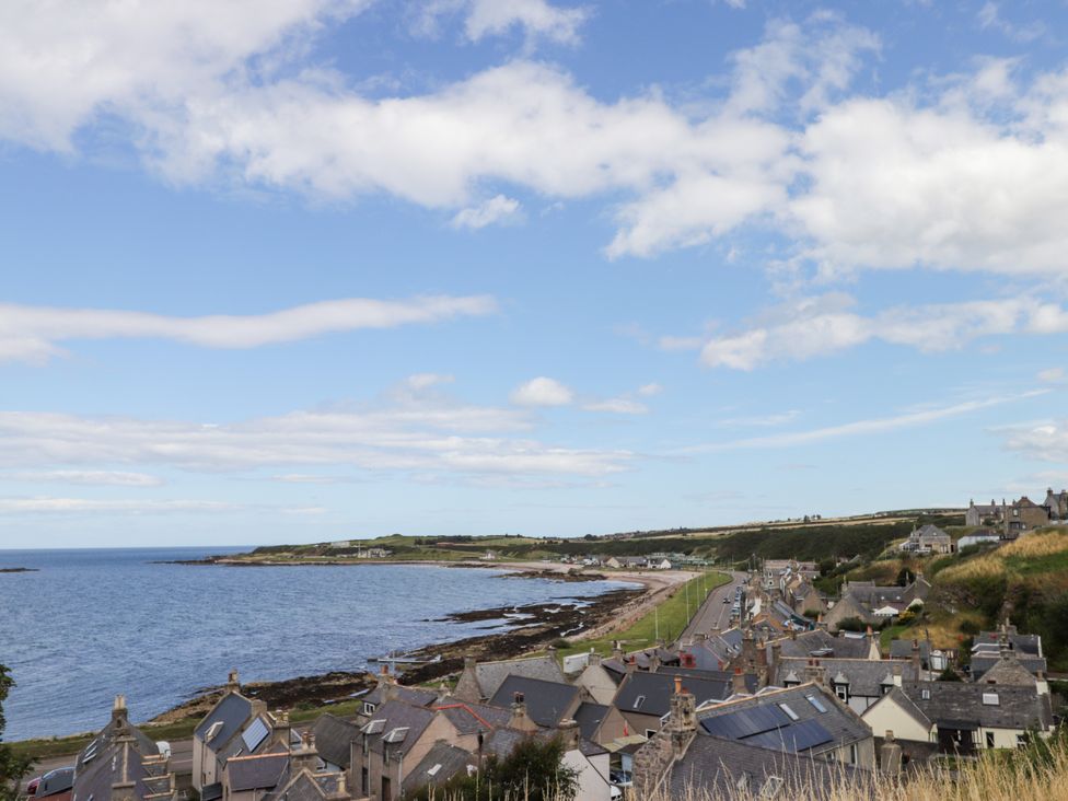 A coastal view showing houses and beach at Braehead Croft Portessie near Buckie
