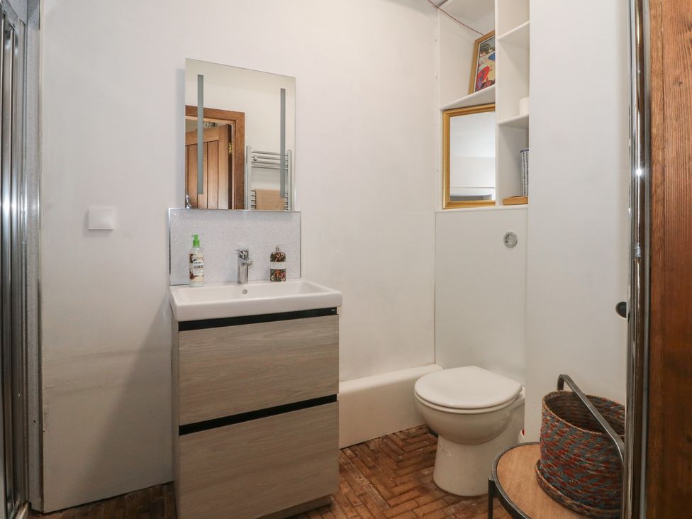 A bathroom with a sink and toilet at Diamond Lodge Ingestre near Great Haywood