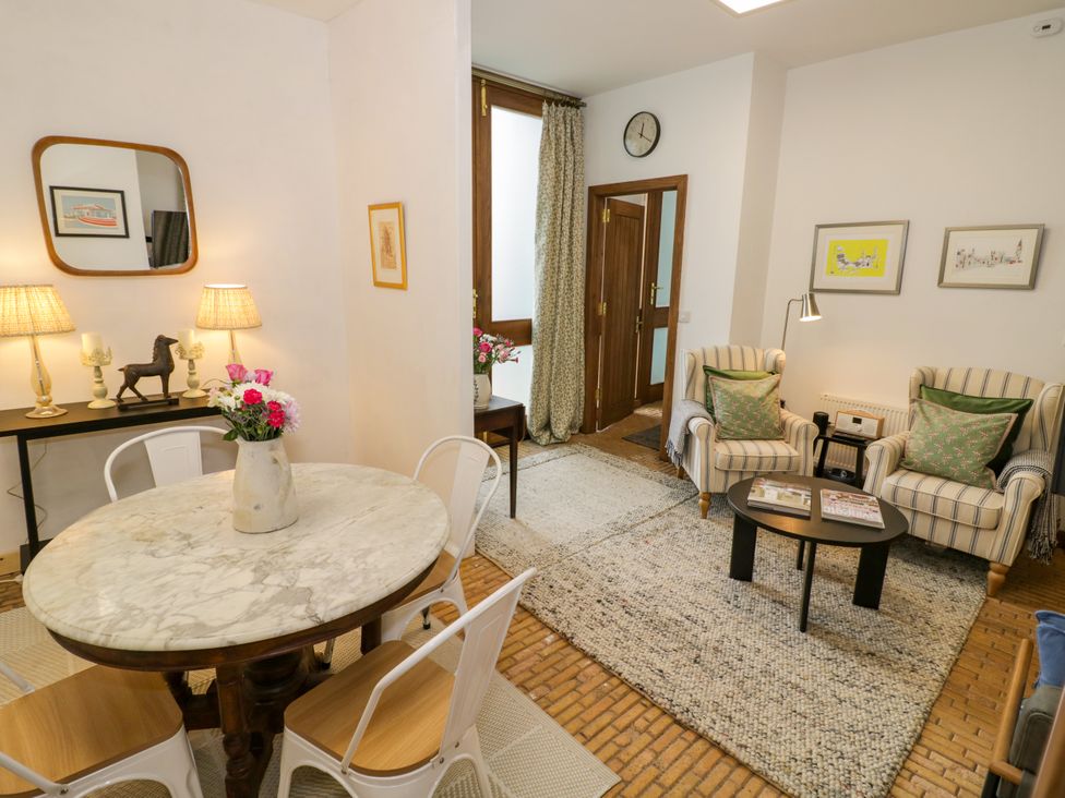 A living room with a table and chairs at Diamond Lodge Ingestre near Great Haywood