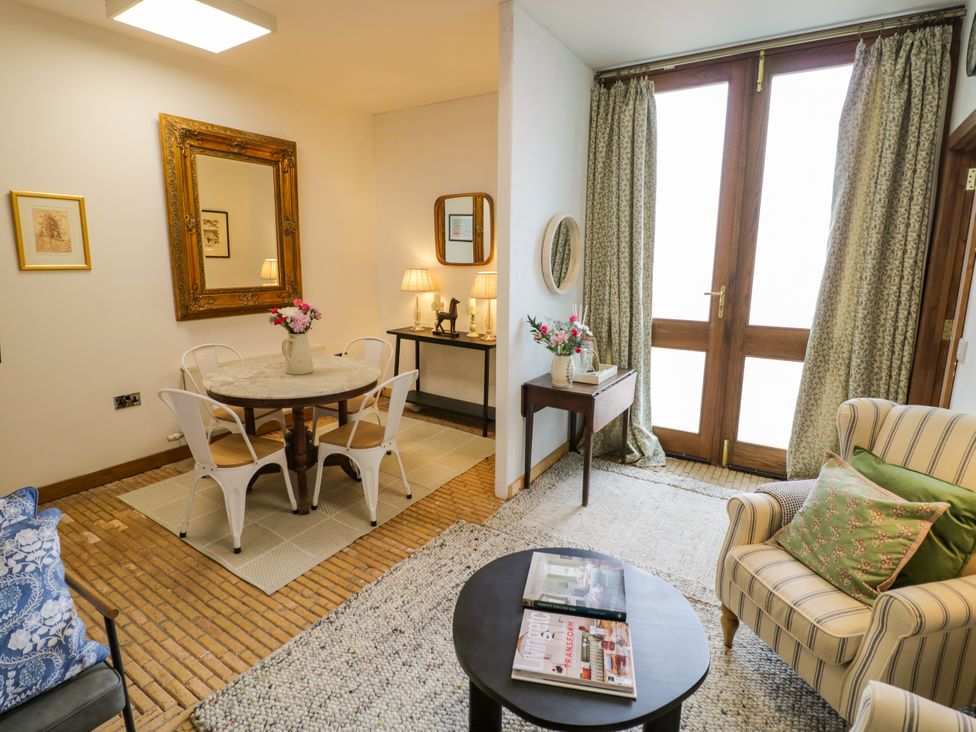 A living room with a table and chairs at Diamond Lodge Ingestre near Great Haywood