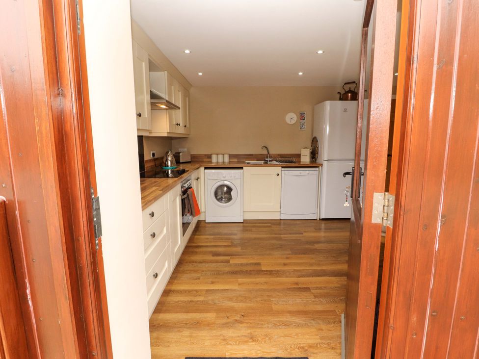 A kitchen with appliances and countertop at The Old Bothy Bolton Low Houses near Wigton
