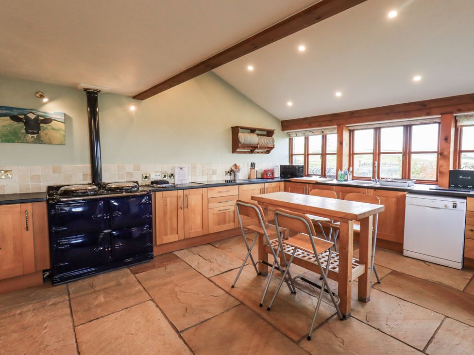 A kitchen with cabinets and an oven at Usherwoods Dairy in Tatham