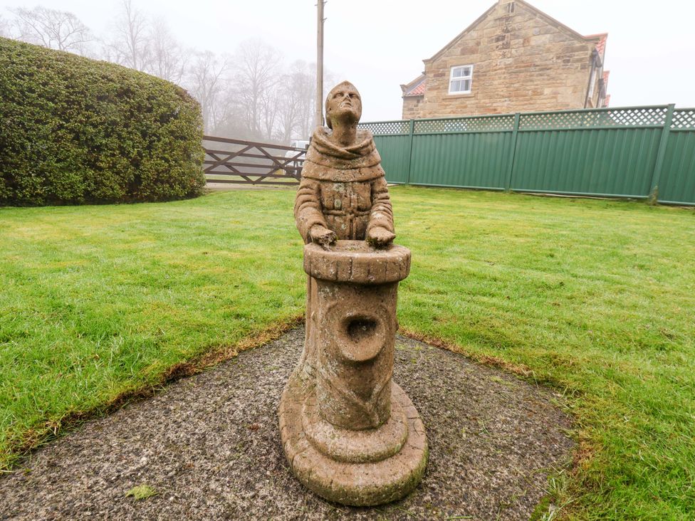 A statue in a garden at Dilston House in Goathland