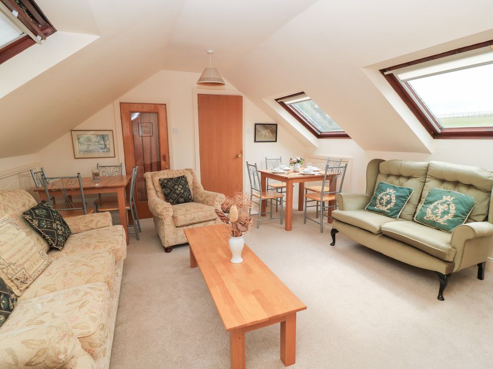 A living room with furniture at Uplands Over Compton near Sherborne