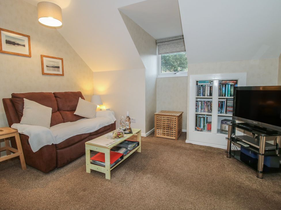 A living room with a sofa and coffee table at Southview in Clee Hill near Ludlow