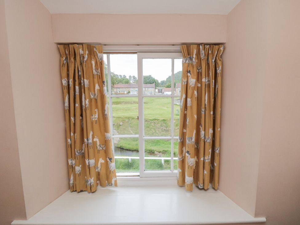A window with curtains at Brookleigh in Hutton-le-Hole