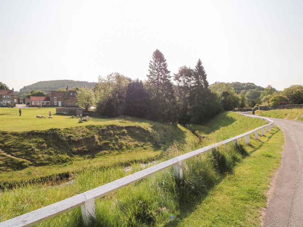 An outdoor scene with houses and a road at Brookleigh in Hutton-le-Hole
