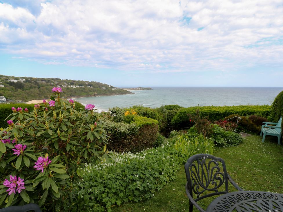 A garden overlooking the ocean at Apartment 1 Llewellan in St Ives