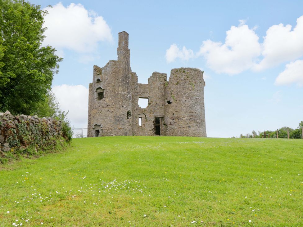A view of stone ruins on grass at Ballaghboy Cottage in Boyle, County Sligo