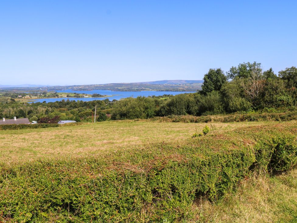 A view of a lake and fields at Ballaghboy Cottage in Boyle, County Sligo