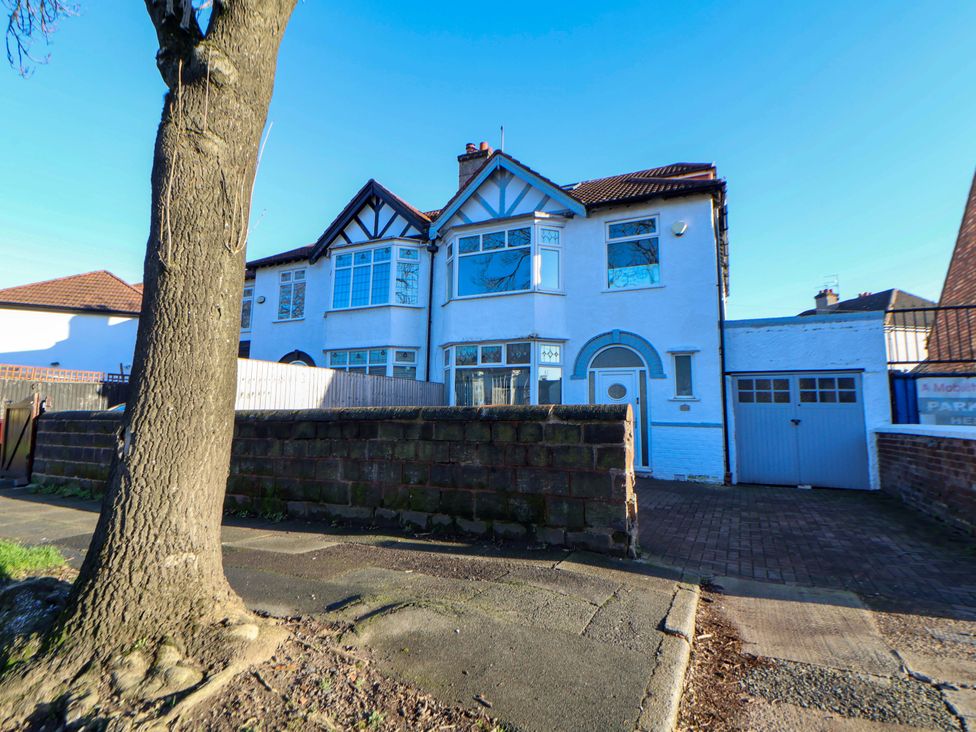 A house with a garage and a tree at 139 Thomas Lane