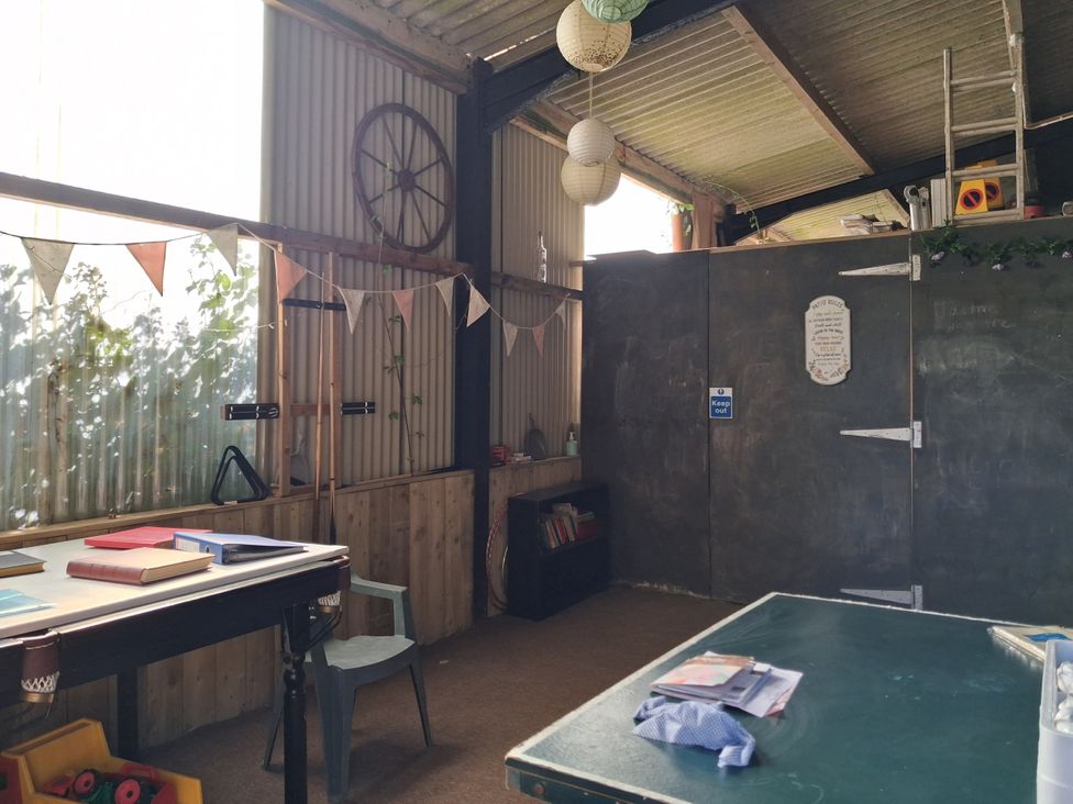 A studio with a desk and chairs at Woodstone Barn Whitchurch near Tavistock