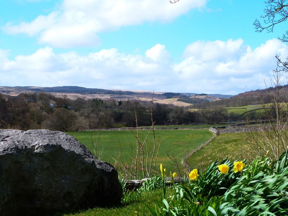 A view of hills and flowers at Chamber End Fold Grassington