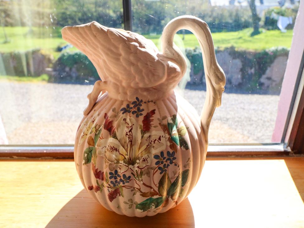 A decorative jug with floral design at Stone Cottage in Waterville, County Kerry