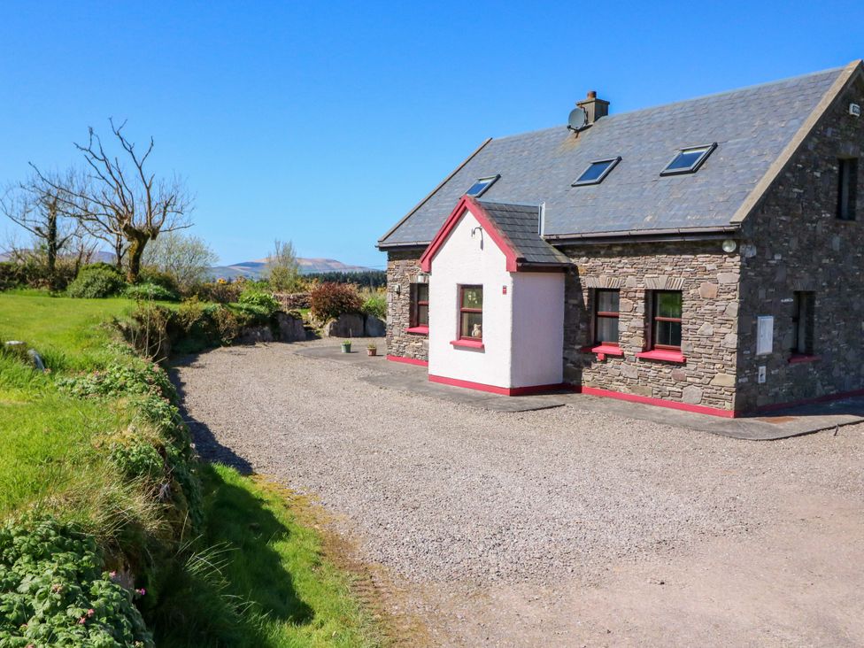 A house with a gravel driveway in Stone Cottage, Waterville, County Kerry