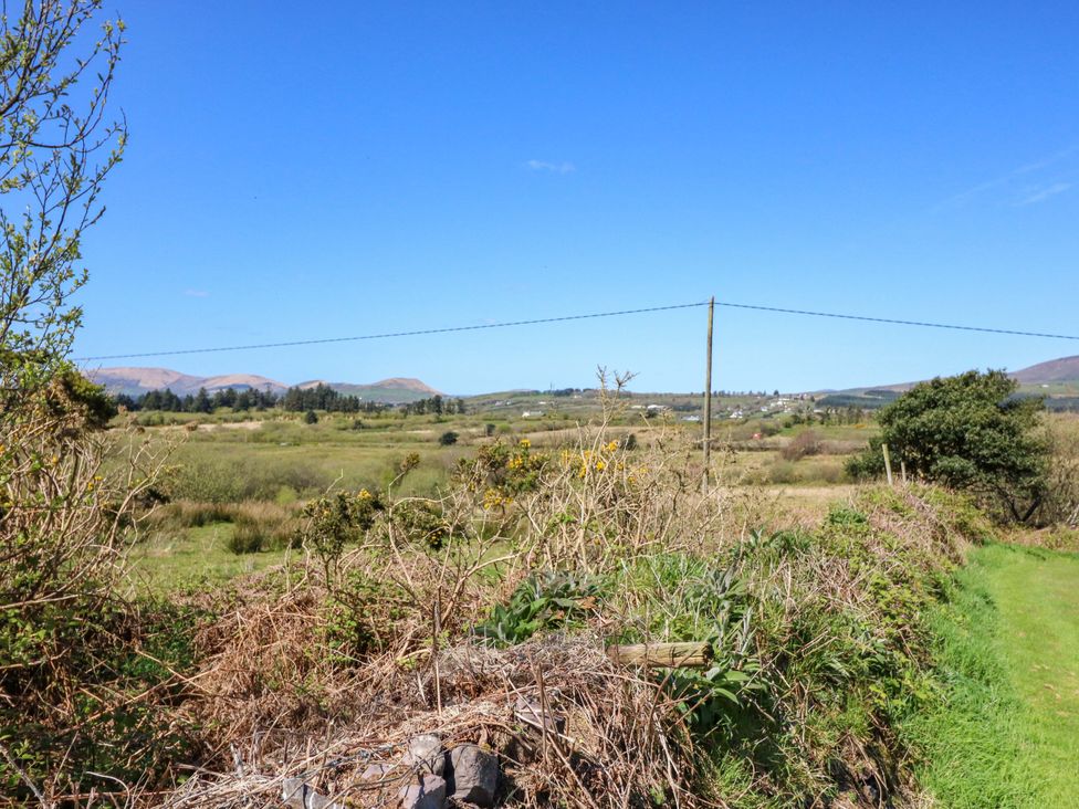 A view of hills and fields at Stone Cottage in Waterville, County Kerry
