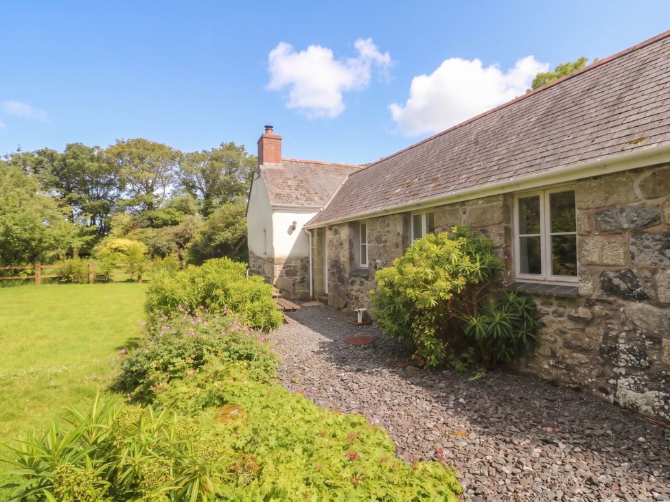 A house with a garden and pathway at Swallows in St Keverne, Lizard Peninsula
