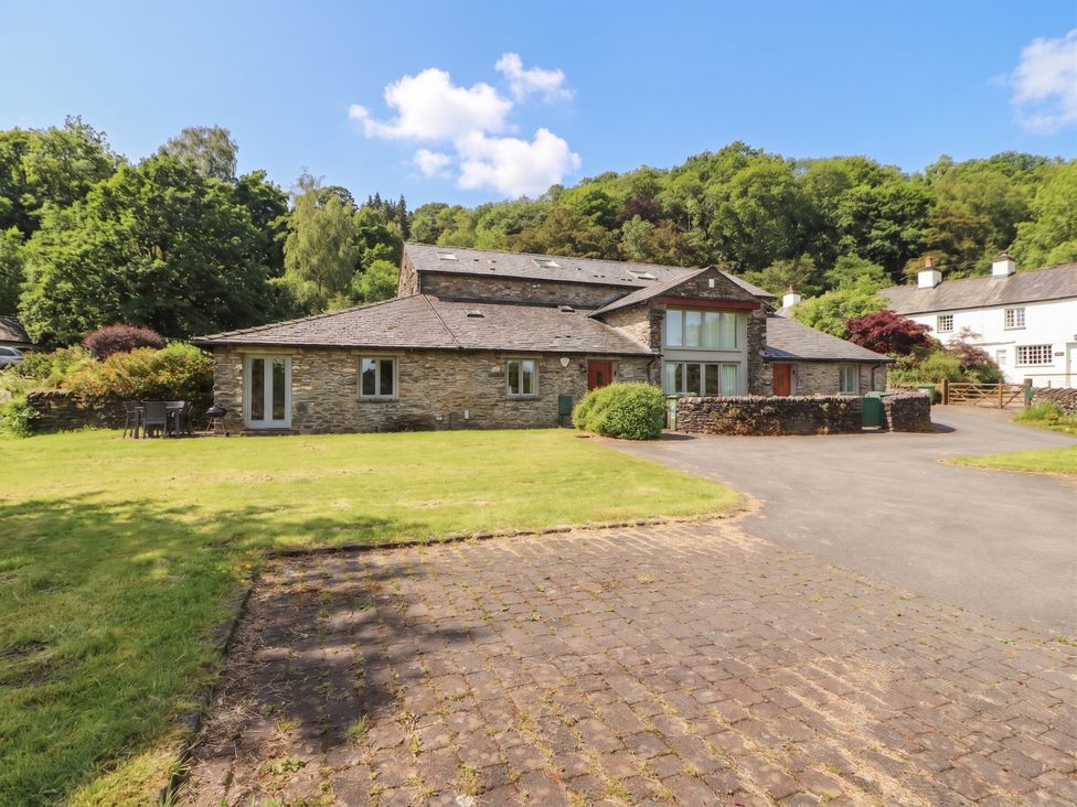 A house with a garden and pathway at Winster Fields Cartmel Fell near Windermere