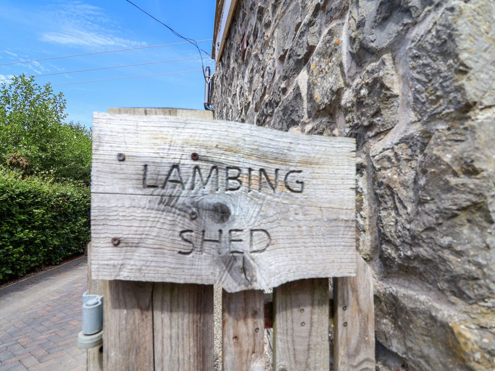A wooden sign stating Lambing Shed at The Lambing Shed Dyserth near Prestatyn