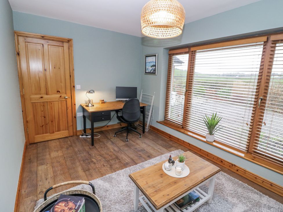 An office with desk and computer at Lough Cluhir Cottage, Union Hall, County Cork
