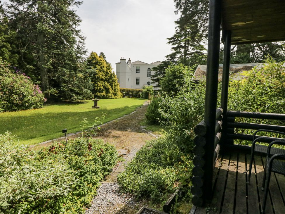 A garden with a pathway leading to a house at Buttermere in Spark Bridge near Greenodd