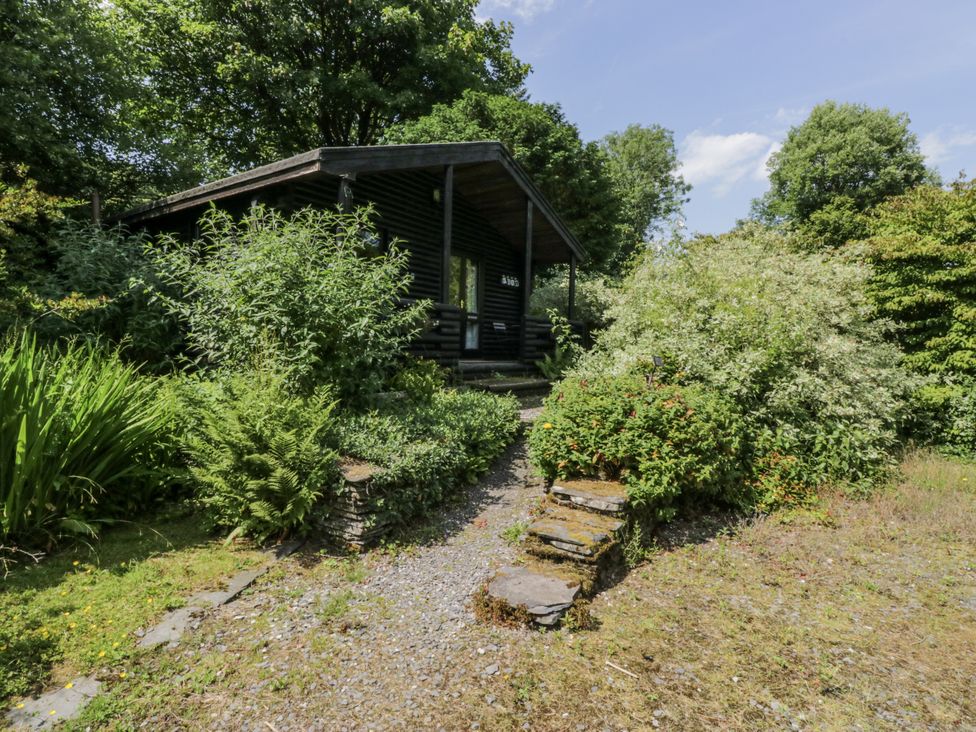 A cabin surrounded by greenery at Buttermere near Spark Bridge